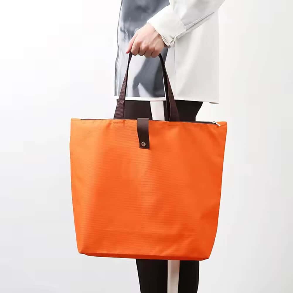 foldablebag orange holding